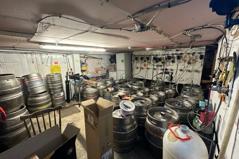 The cellar is kitted out to store plenty of used and unused kegs.