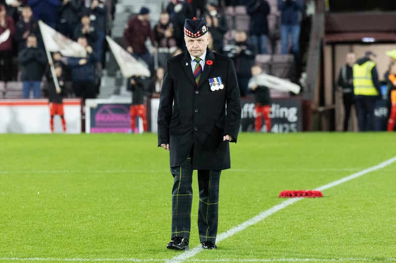 A poppy from the Royal Scots is left on the centre circle