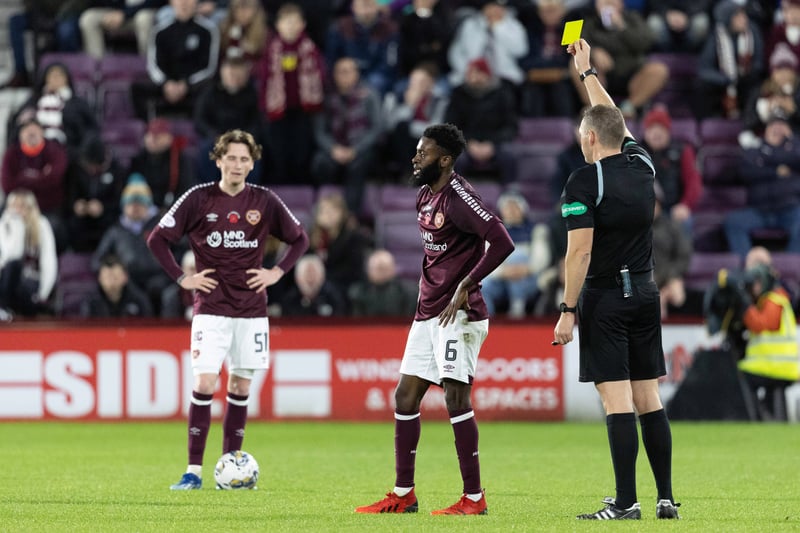 Beni Baningime is booked in the first half at Tynecastle.