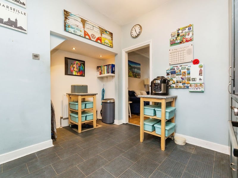 The kitchen has more space than it first appears, with additional room for storage and more under the stairs. (Photo courtesy of Zoopla)