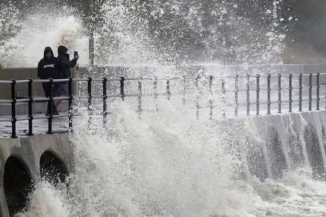 Waves crash over the promenade in Folkestone, Kent, as Storm Ciaran brings high winds and heavy rain along the south coast of England.