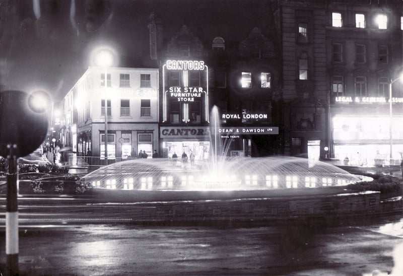 The old Goodwin Fountain at the top of Fargate, in Sheffield city centre, is pictured here in 1961, with the jets of water illuminated following the official switch-on.