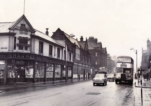 West Street in Sheffield looks very different now to how it did when this photo, showing the grocery store Sharman, was taken in January 1961. The caption at the time read: "The junction of West Street with Fitzwilliam Street - an illustration of a self-contained shopping centre, away from mid-city bustle, yet with stores to meet virtually every demand of the housewife and her family."