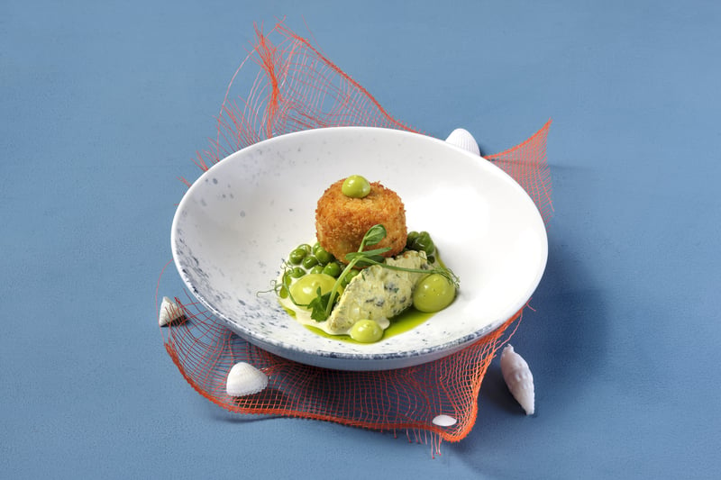 Scampi with brandade, dill emulsion, gribiche, peas and beurre blanc