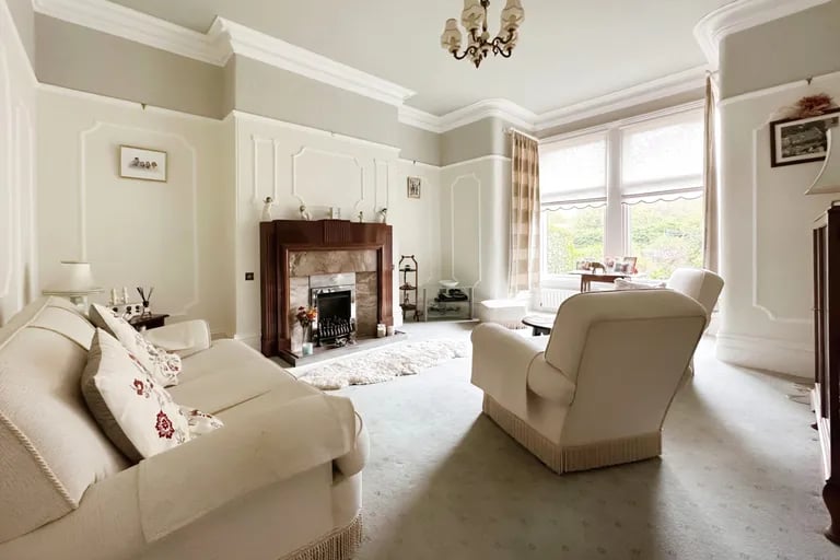 The stunning lounge has a massive bay window overlooking the rear garden for lots of natural light.