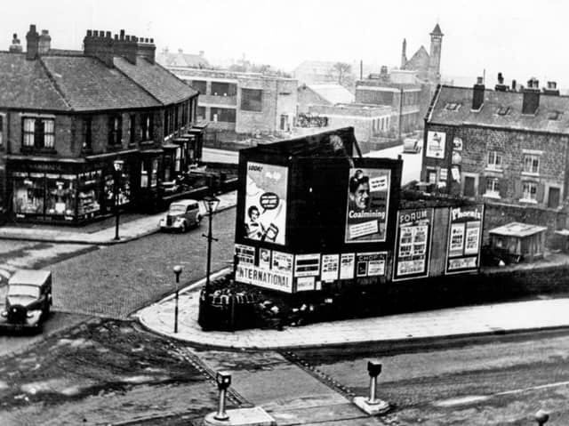 The junction of Penistone Road and Bradfield Road, Owlerton Green, in October 1958, showing W.R. Swann and Co. Ltd Surgical Instruments Manufacturers in the background. The tower belongs to St John the Baptist Church. Photo: Picture Sheffield