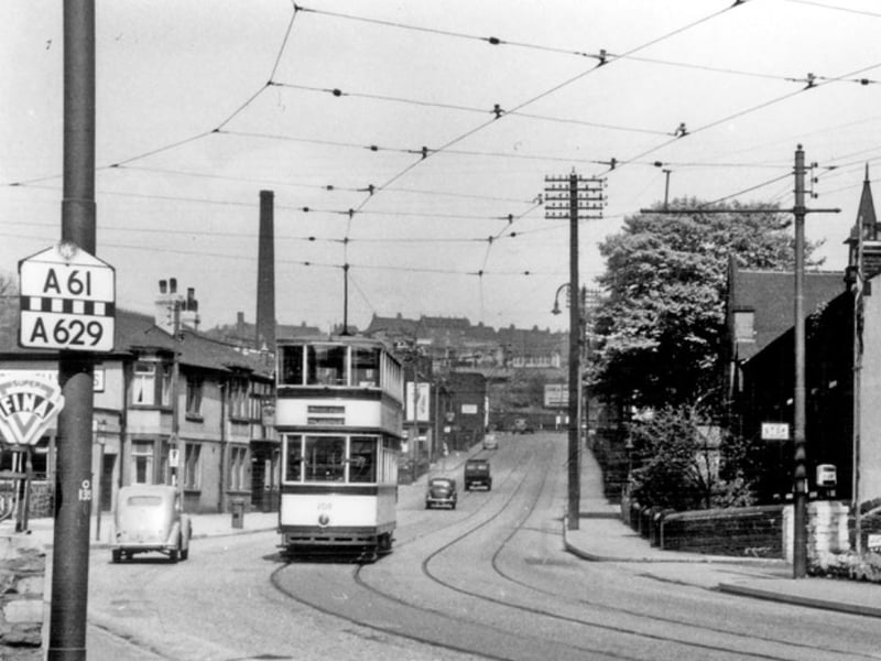 Penistone Road North, Sheffield, looking towards Wadsley Bridge Methodist Church (right), and showing Tram No. 208. This photo was taken some time during the 1940s or 50s. Photo: Picture Sheffield