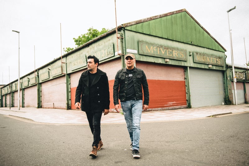 Dante and Jools of Gun walking through the Barras - the hard rock band released seven studio albums, three of which have made the UK Top 20, and had eight UK Top 40 hit singles.