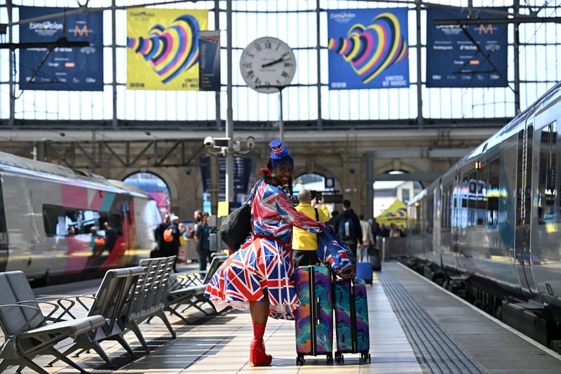 A Eurovision super-fan arrives at Lime Street Station ahead of the final.