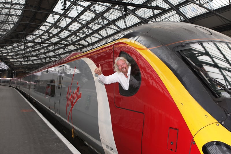 Billionaire owner Sir Richard Branson promotes Virgin Trains at Lime Street.