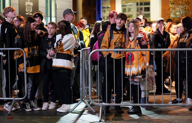 Fans gathered outside the Motorpoint Arena, Nottingham, ahead of a memorial for Nottingham Panthers' ice hockey player Adam Johnson on November 4. Photo: Zac Goodwin/PA Wire.