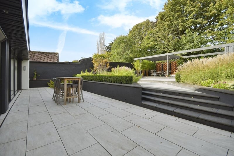 Outside the property is off-road parking, and a stunning landscaped garden. This home would be perfect for al-fresco dining with the family in summer.