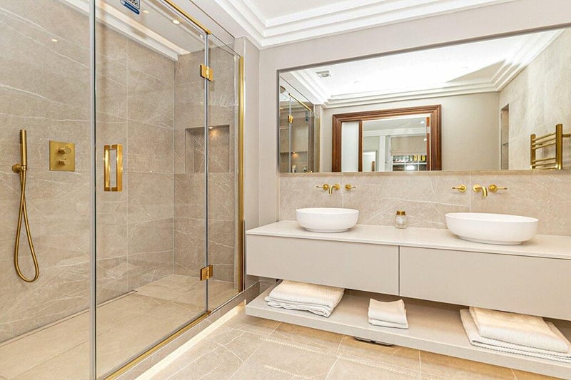 The stunning en-suite shower room connected to bedroom one has also been designed by  Bagno Design. 