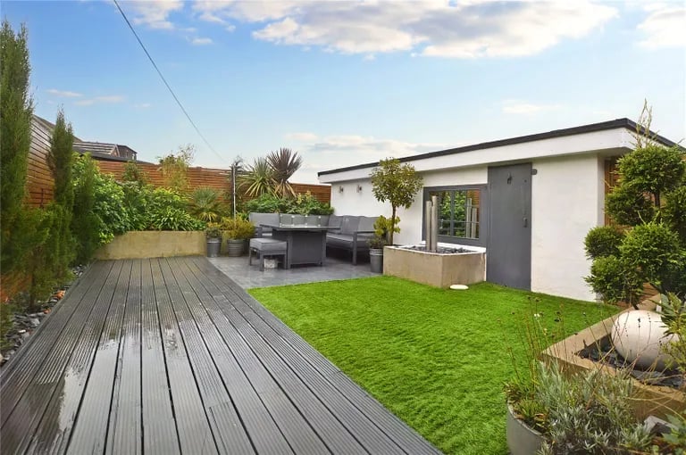 It also has artificial lawn and decking.