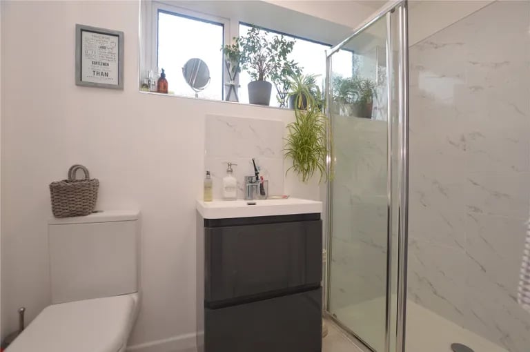 A modern WC and shower room.