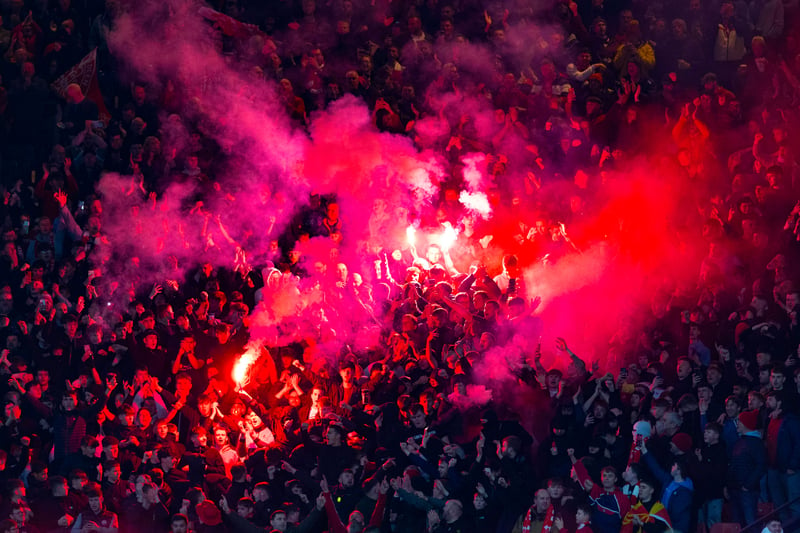 Aberdeen fans set of flares ahead of kick-off against Hibs.
