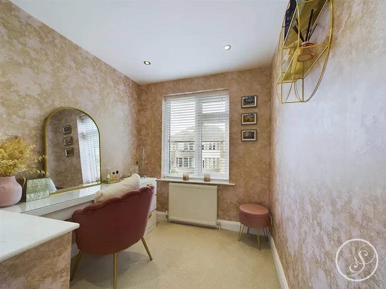 The third bedroom can be used as a dressing room or study.
