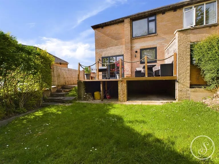 The south facing garden laid to lawn.