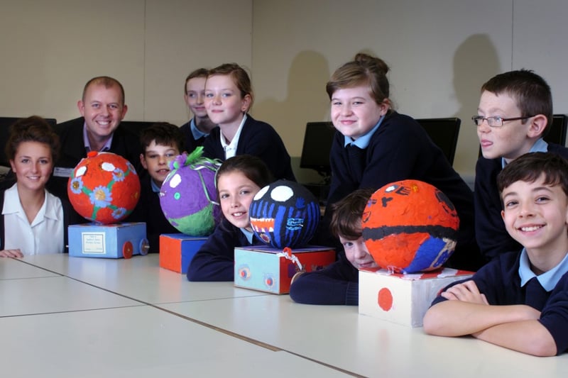 Year 6 pupils with the Daruma Dolls they made in 2012.
