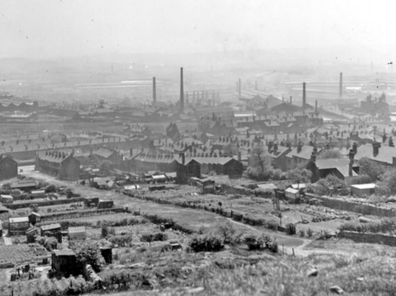 The view from Wincobank Hill, Sheffield, of the allotments, Walling Road, Tipton Street and Sanderson Street, and across to the Brightside Works and River Don Works, in 1930