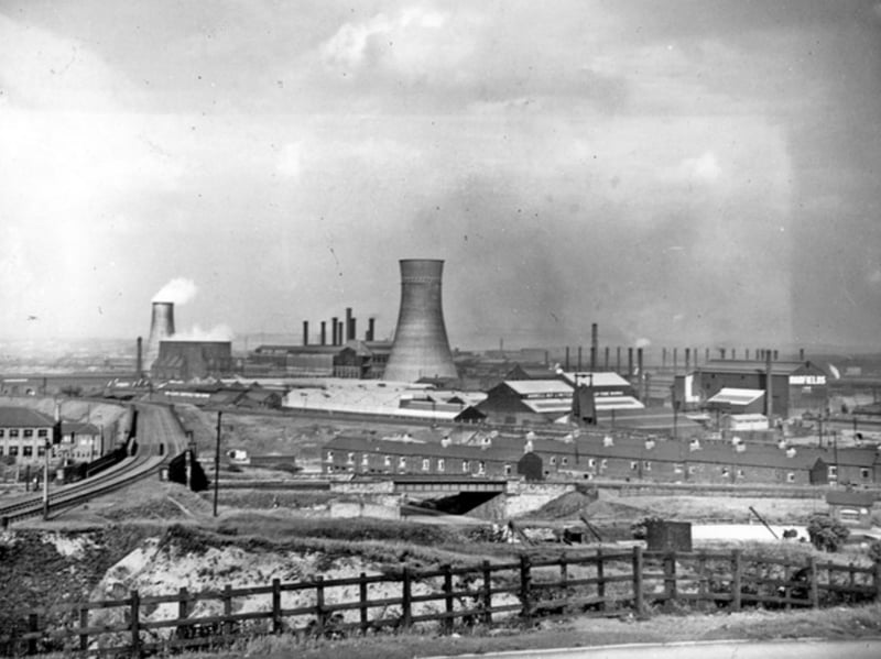 Sheffield's industrial Lower Don Valley, viewed from Tyler Street, looking across the L.M.S. Railway towards Midland Place, Midland Lane, Cromer Street, Hadfields East Hecla Works, and Sheffield Tube Works to the Water Cooling Tower of The Electric Power Station some time in the 1920s or 1930s