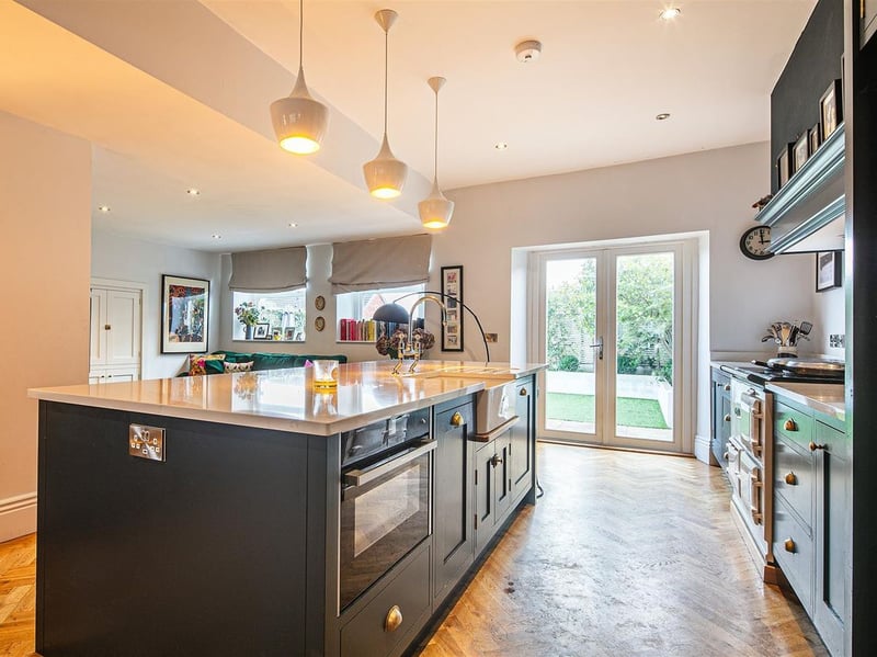 The kitchen is fitted with "superb units and integrated appliances". (Photo courtesy of Spencer Estate Agents)