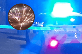 Yobs in Crookes launched fireworks and bricks at a passing police car on Bonfire Night