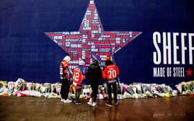Fans lay their respects and lay flowers tributes at the Utilita Arena Sheffield, where Nottingham ice hockey forward Adam Johnson died during a game against the Sheffield Steelers.