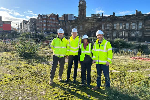The former Castle Market site in Sheffield city centre as it looks now, with the Old Town Hall in the background. Work is set to start soon to transform it into a new riverside park, with the remains of Sheffield Castle on display. Pictured are Chris West, head of operations at Keltbray; Louise Pavitt, major project director at Keltbray; Lucia Lorente-Arnau, principal development officer at Sheffield City Council; and Councillor Ben Miskell, chair of Sheffield City Council's Transport, Regeneration and Climate Committee.