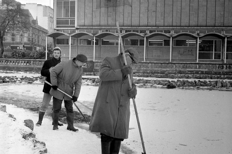 Workers breaking ice in Mowbray Park in 1973.