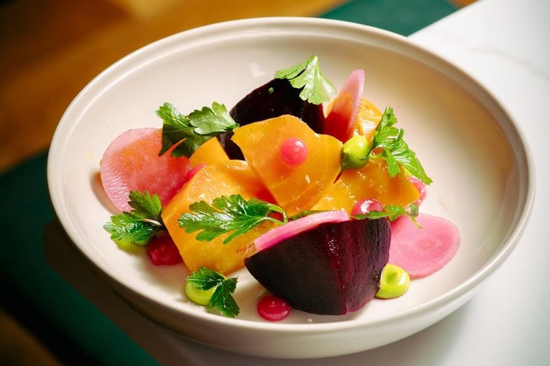 Beetroot, parsley emulsion, peach. Packs a lot of flavour across the different types of beets, a dish for winter nights. 