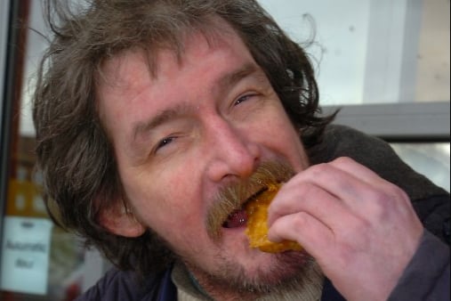 Trying out frog's legs at Katie Mac's fish and chip shop in 2010.