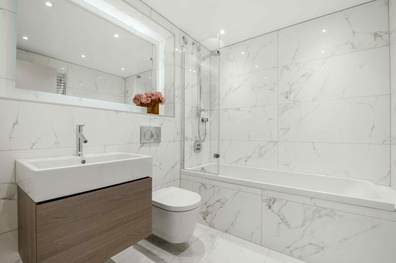 The family bathroom is also found on the first level and like all the bathrooms features Porcelanosa tiles and Durvait sanitary ware. They also all have underfloor heating, heated mirrors and dual fuel towel warmers.