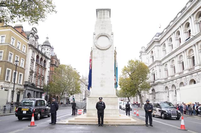 Metropolitan Police officers on duty beside the Cenotaph.  Picture: Stefan Rousseau/PA Wire