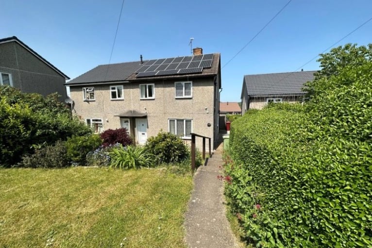 A three bedroom semi on a 'good size' plot. 'The property is of a non-traditional construction and not considered to be mortgageable but offers potential to a cash buyer or investor looking for a rental income'.
