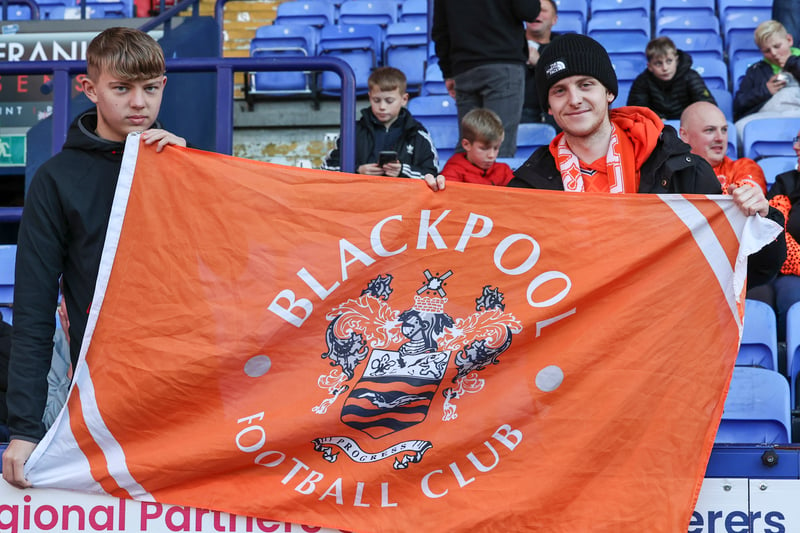 Two young Blackpool fans with their flag.