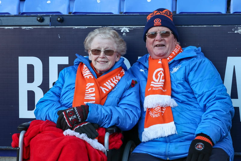 Two Blackpool fans dressed for the occasion, as they wrap up warm in the cold winter weather. 