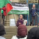 Leni Solinger speaking at a rally at Sheffield City Hall
