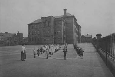 Children at drill during the early 20th century at the Sir John Neilson Cuthbertson Public School