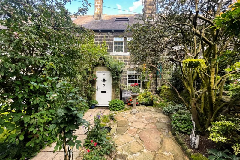 This stunning stone cottage is on the market.