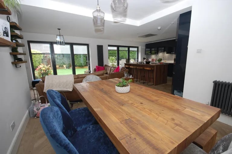 To the back sits this spacious dining area.