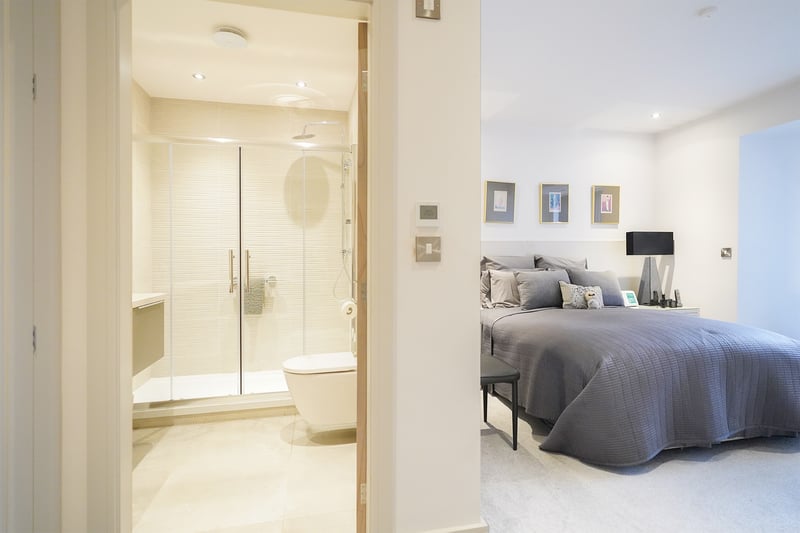 The main bedroom has a sparkling modern ensuite with a walk-in shower.