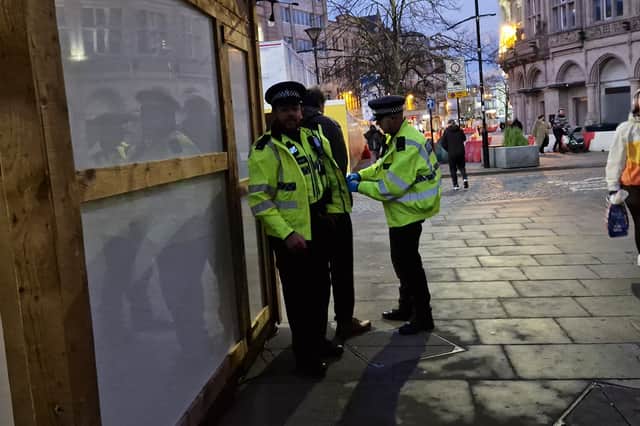 Police carry out a search near Sheffield Town Hall. Picture: David Kessen, National World