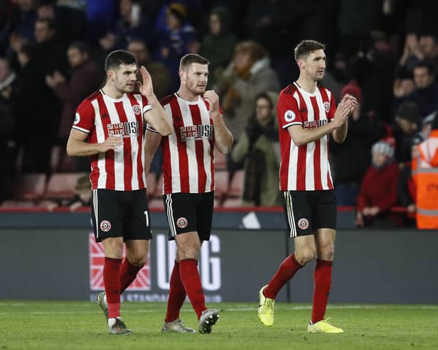 Chris Basham (right) and Jack O'Connell (centre) were pivotal to Sheffield United's success under Chris Wilder