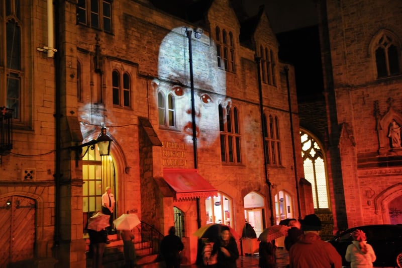 Faces on the walls of the Market Square buildings were a feature of the very festival Lumiere festival in 2009.