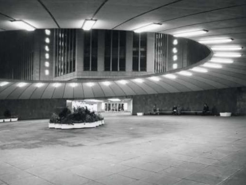 Sheffield's Hole in the Road roundabout and underpass, officially known as Castle Square, is illuminated at night in this photo from 1968, with Walsh's department store visible in the background