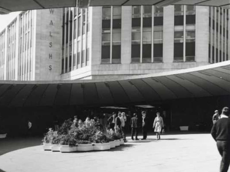 A large planter adds a splash of colour (it's from the days of black and white photos so you'll have to use your imagination) to Sheffield's Hole in the Road in this picture from 1968