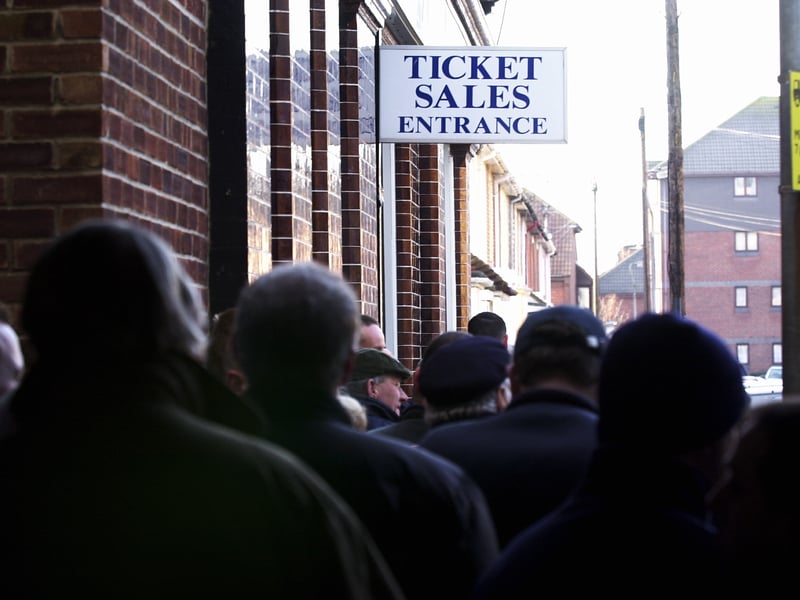 A view from the back of the queue as Pompey fans look for Blues v Arsenal FA Cup tickets in 2004