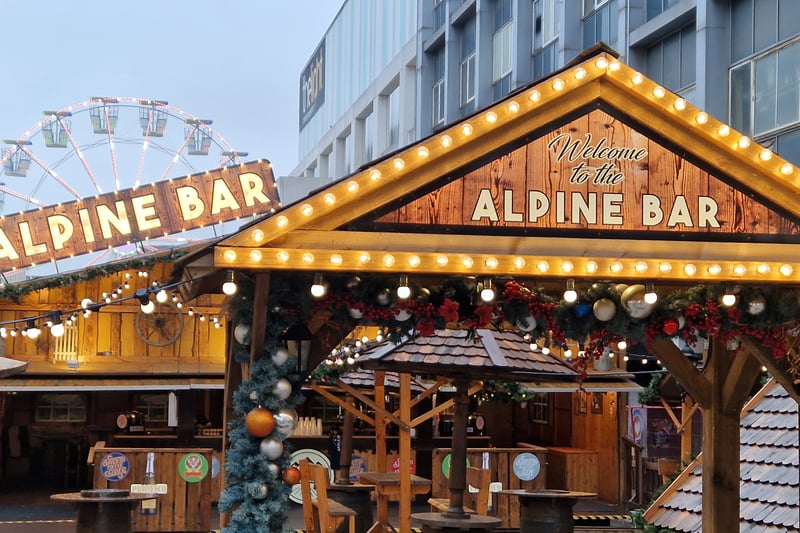 The Alpine Bar on The Moor lit up and ready to serve. Who knows which of the three bars is the busiest throughout the market's stay?