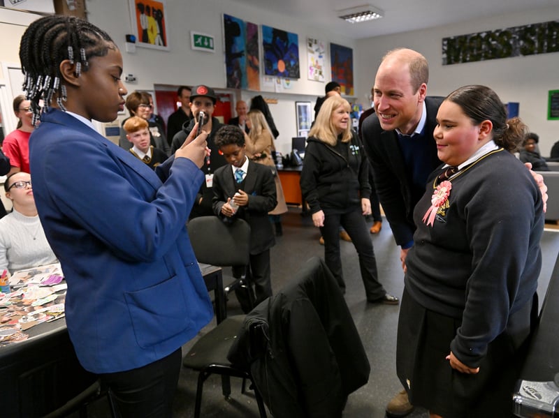 Prince William poses for a picture